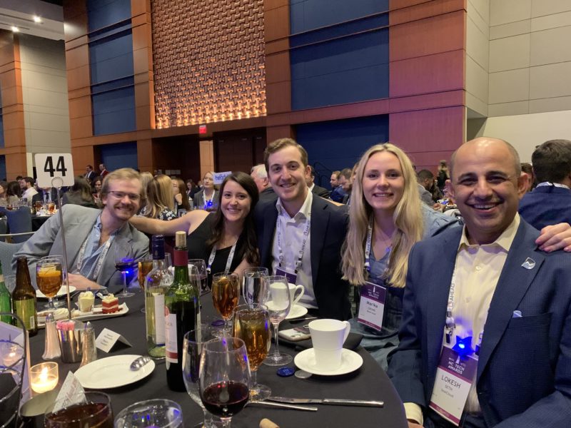 Marika Crowe and co-workers sitting at a table at the NC Tech Awards